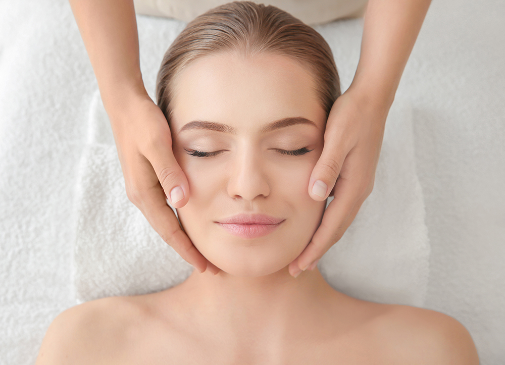 woman being cherished at medical spa, receiving skincare, facial treatments